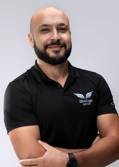 A headshot of George Dolidze, Sales at Zina Flight.