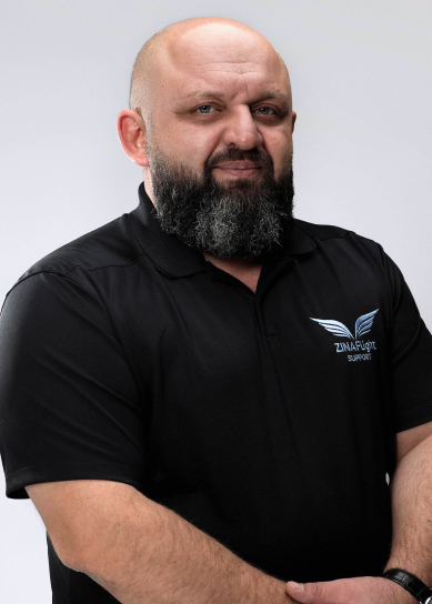 A headshot of Irakli Pachulia, Director of Sales CIS and Eastern Europe at Zina Flight.